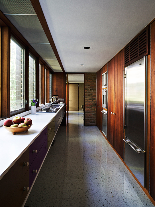 The galley-style kitchen cabinets are all original and were repainted to match Nelson's specifications using the Container Corporation's Color Harmony Manual.